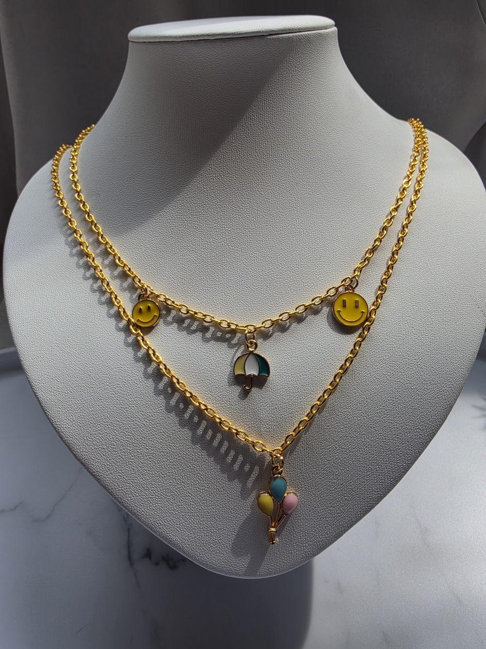 Gold-Tone Layered Necklace with Yellow Smiley & Multicolor Charms - Picture 4 of 5